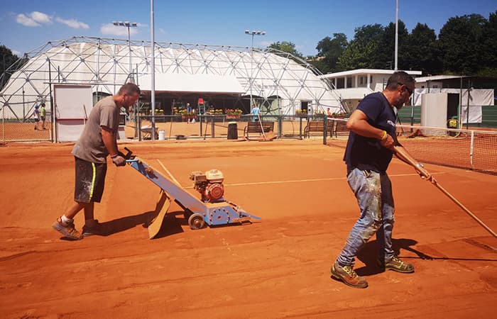 Tennis red clay court maintenance